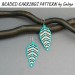 Turquoise leaf beaded earrings crafted using intricate beading pattern