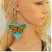 Oversized butterfly triangle earrings